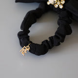 Black Gold Ribbon Pony