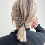 Silk Studs Pony Black Gold